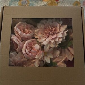 Pink faux flowers in Box
